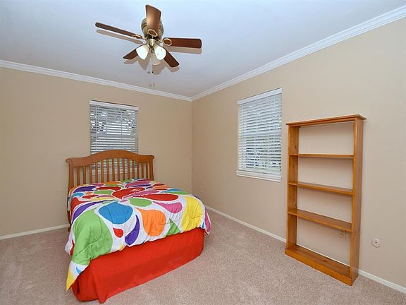 2nd bedroom with walk in closet. Closet is large with window