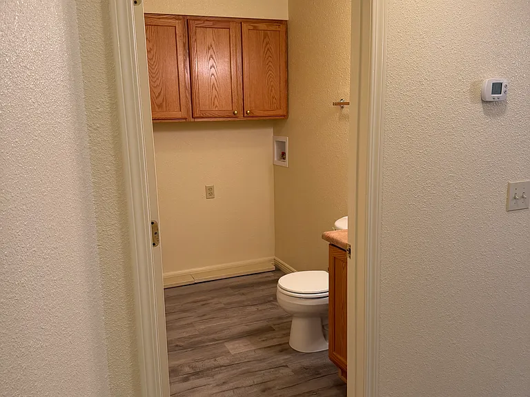 Laundry room, half bath.