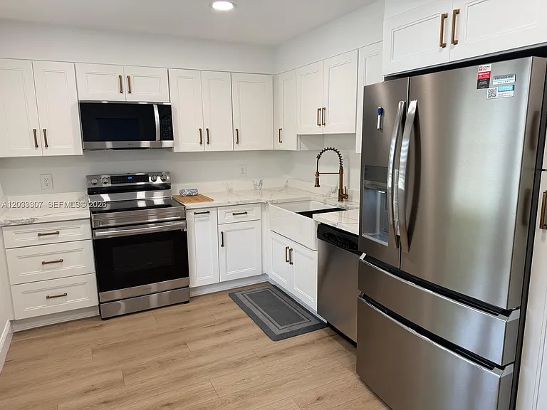 4261 W Palm Aire Dr #202 — Photo 5