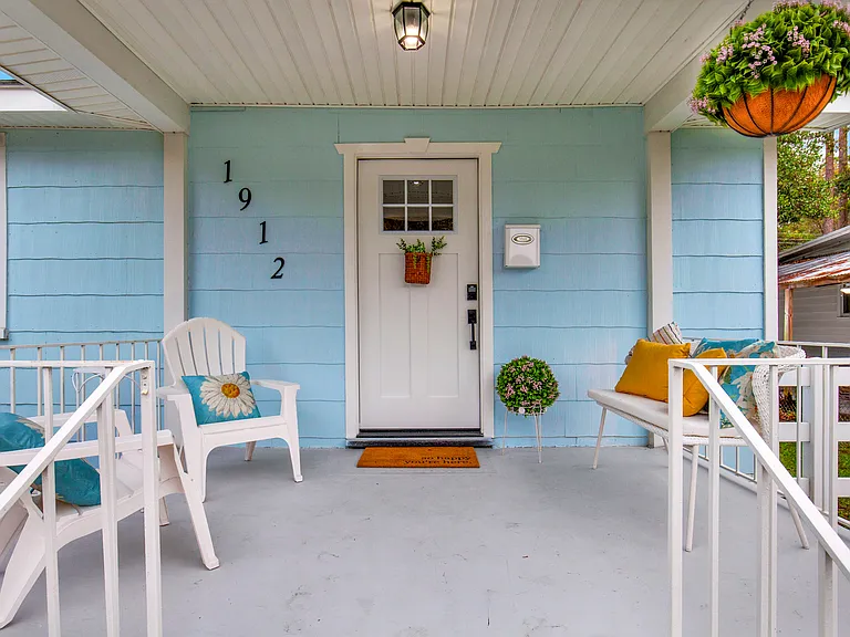 Covered front porch with seating