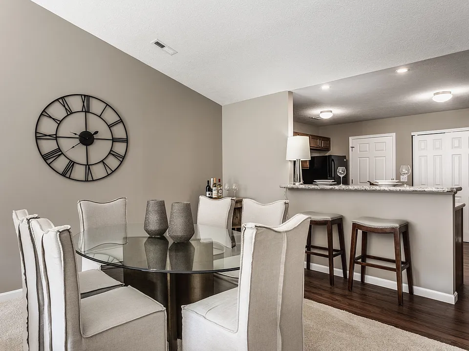 Enjoy meals and gatherings in a spacious dining area that flows seamlessly into the kitchen, designed for both comfort and convenience.