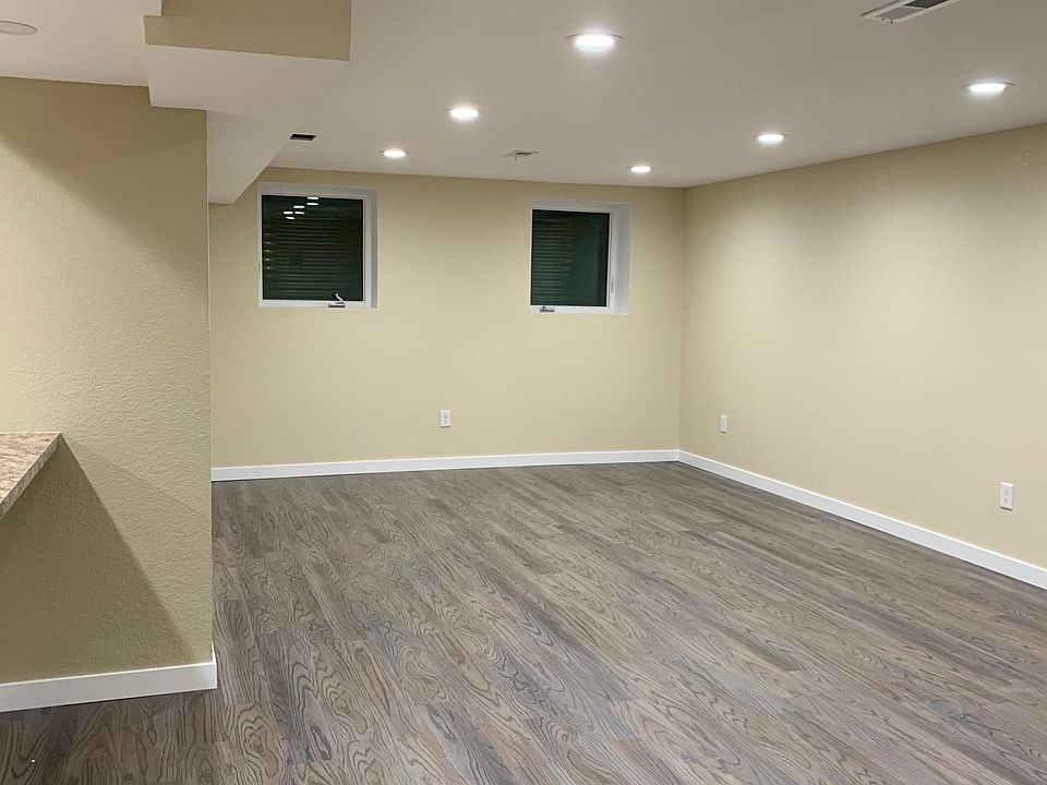 Large Living Room with great lighting which includes dimmers so you can adjust the lighting to your liking.