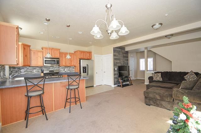 Spacious and open main floor! Doors lead. to the pantry and laundry room.
