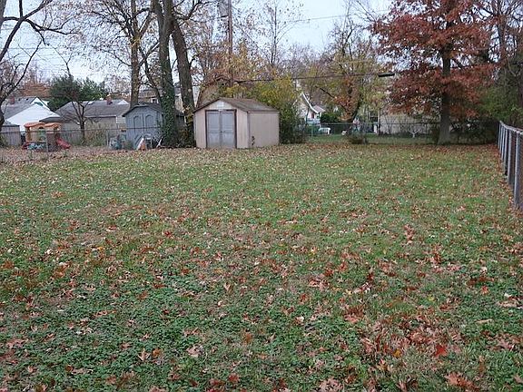 Rear yard w/ shed is fully fenced!