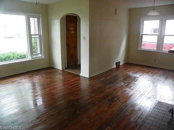 Foyer in front entry way  dining living room combo  Nice wood flooring