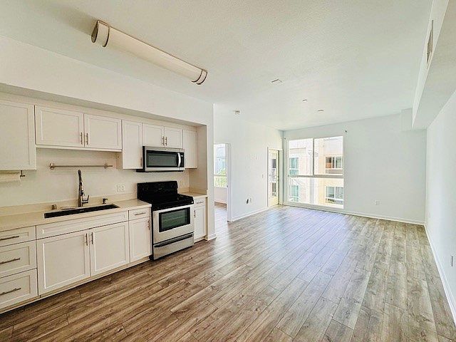 1st image of 12655 Bluff Creek Dr Unit 407