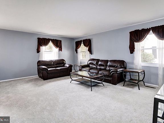 Living Room With New Carpet And Paint