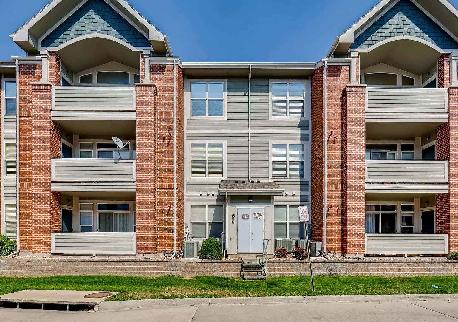 Bright 2-Bedroom Aurora Condo | Fireplace, Balcony + Community Pool — Photo 1
