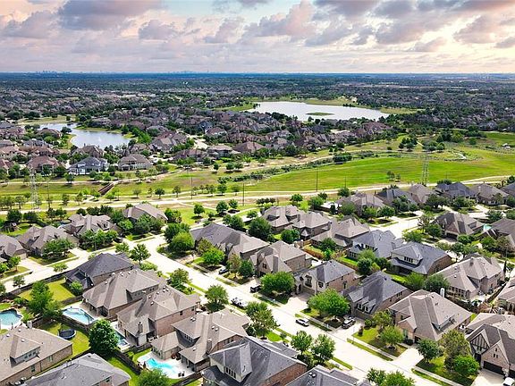 Situated in the beautiful well-known master-planned community of Cinco Ranch