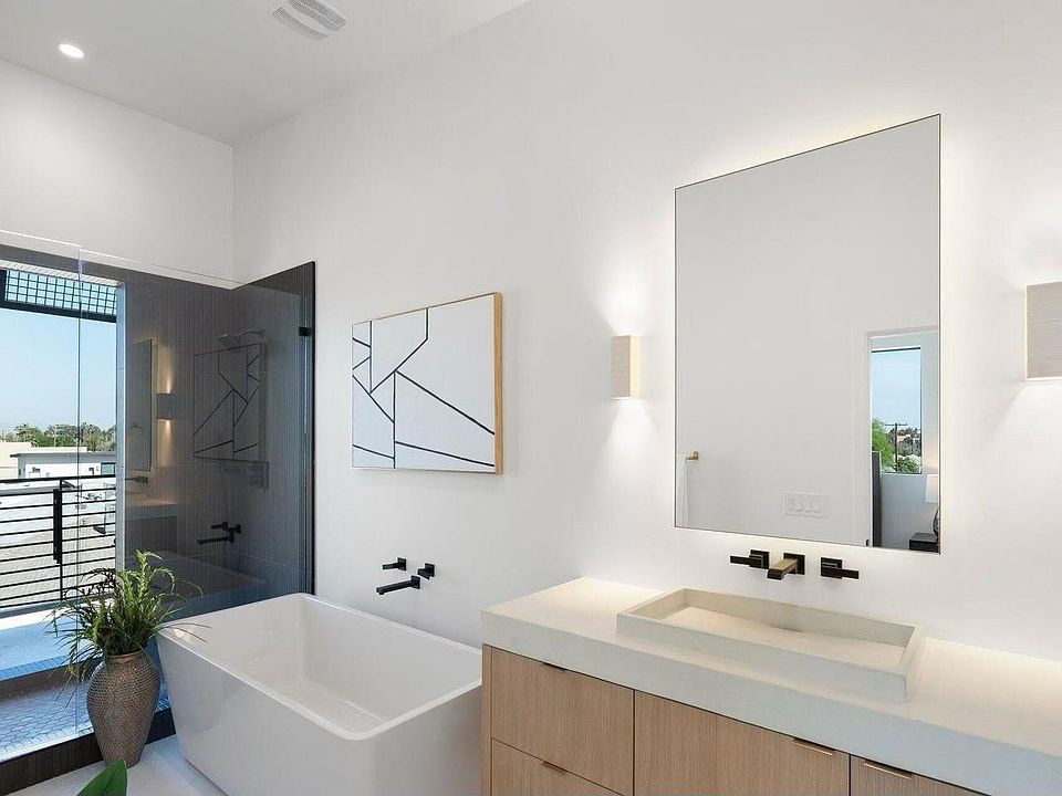 Master Bath Soaking Bathtub. Handmade Sconces from India.