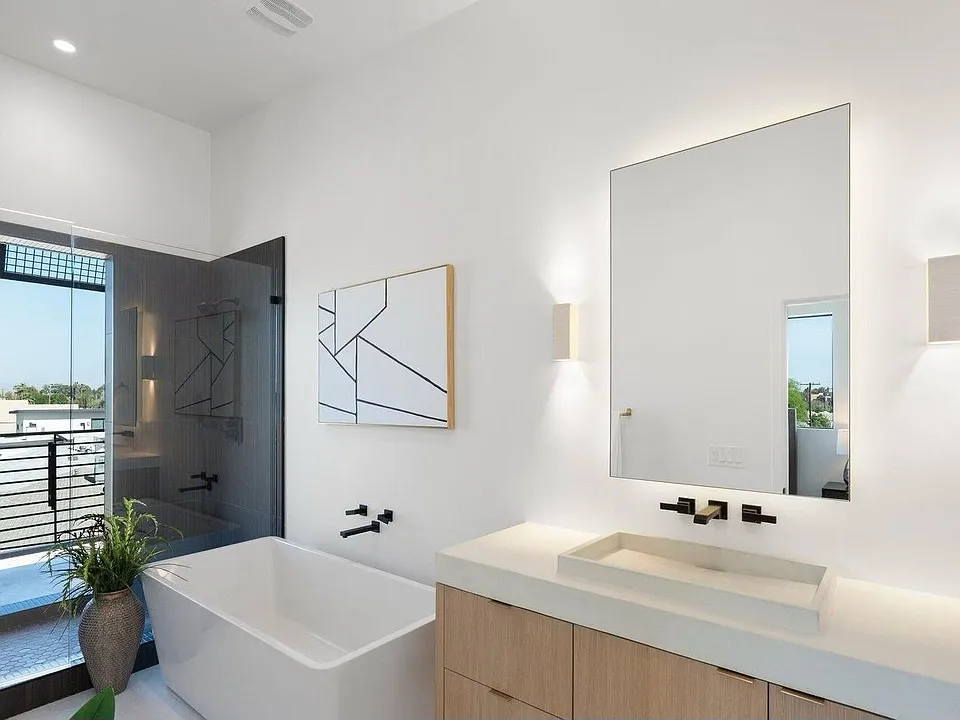 Master Bath Soaking Bathtub. Handmade Sconces from India.