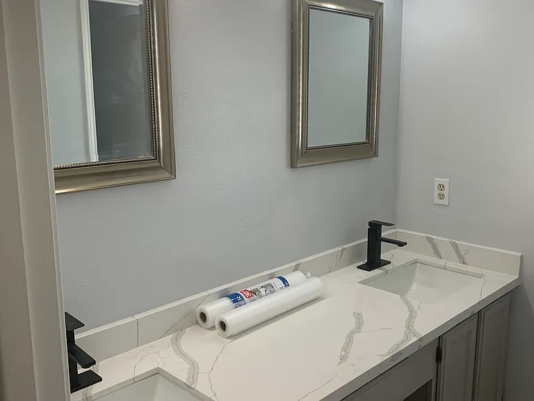 9. Remodeled Master bath with his & her's and relaxing soaking-tub bath with new ceramic tile surround