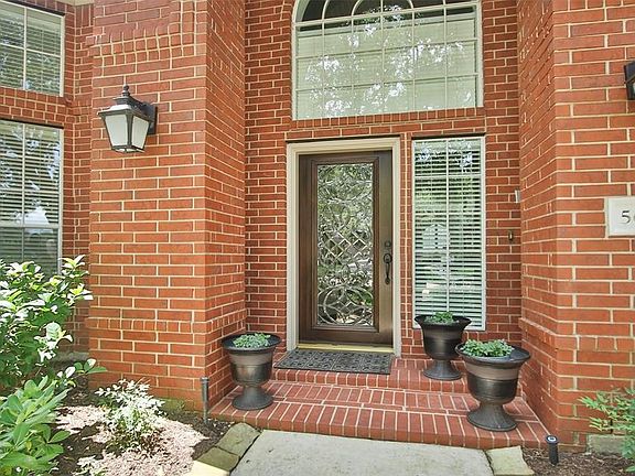 Solid wood door incased with cut glass has just been refinished. Come take a look inside and you are sure to want this as your home.