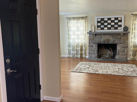 Front door into the living room. Fireplace DOES NOT WORK!