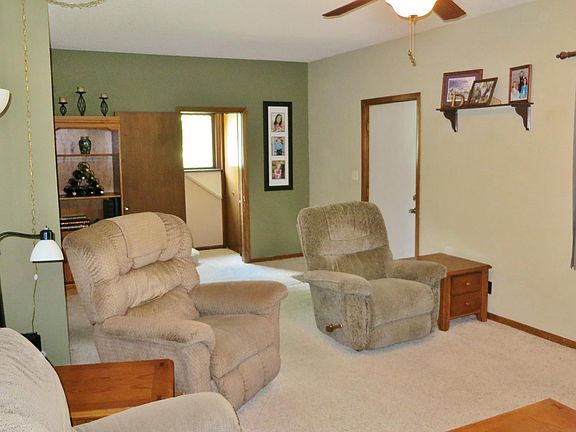 Front entry and stairway (note--carpet has been replaced with laminate flooring)