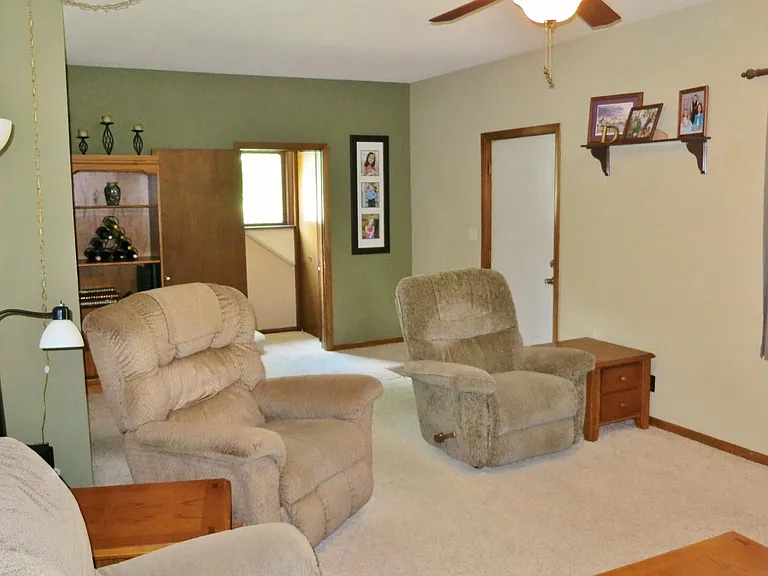 Front entry and stairway (note--carpet has been replaced with laminate flooring)