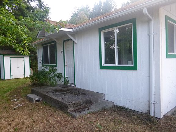 Front View of House and Shed