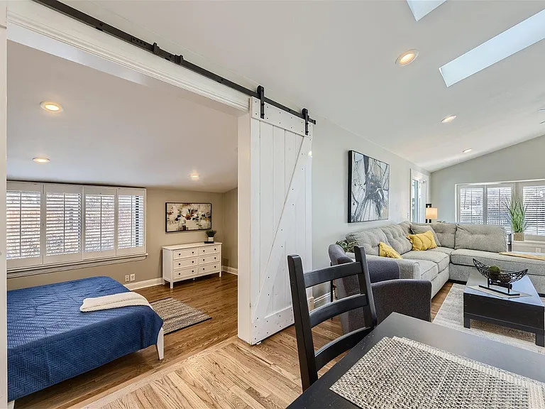 Pocket door opens large primary bedroom