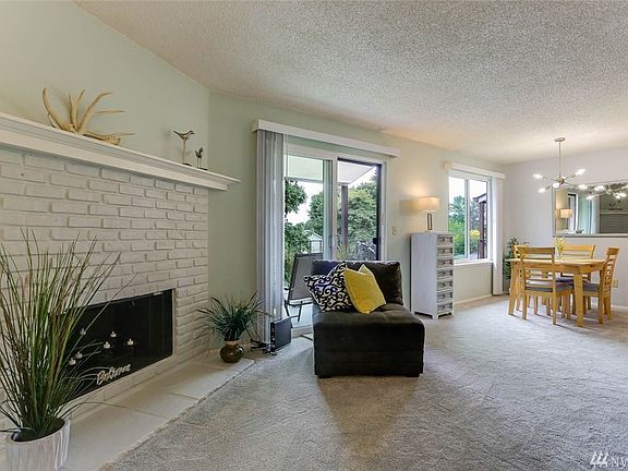 The living room opens to the dining area creating a wonderful entertaining space.