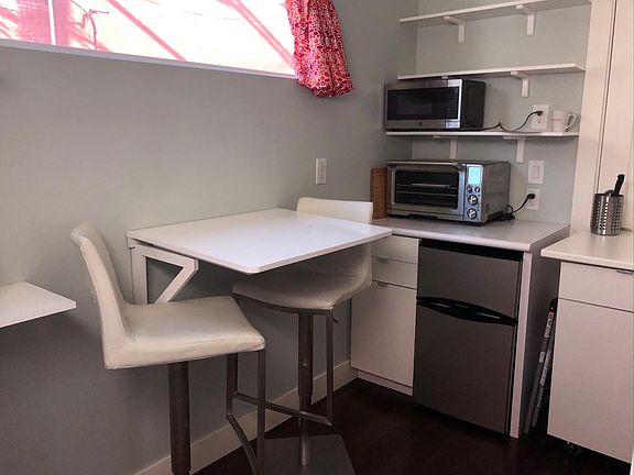 Table folds out for flexible, useable space.