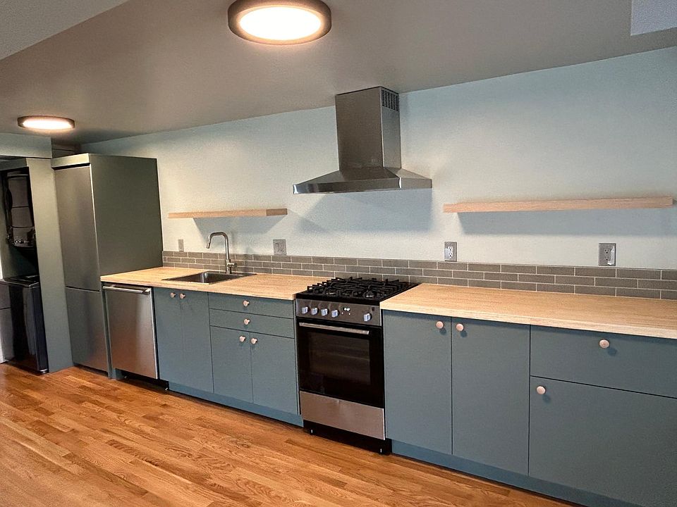 Brand New Kitchen & Brand New Appliances. 

Includes a gas dryer + new washer. (Stackable Unit)