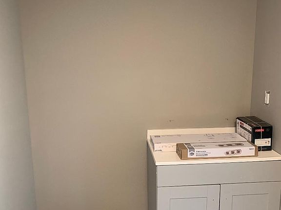 Half bath/laundry room off of kitchen