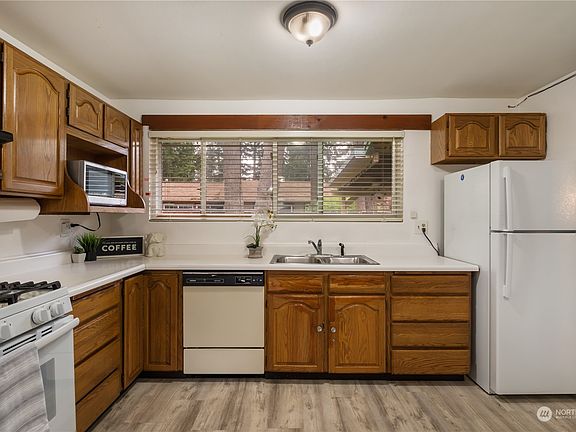 Large open kitchen with ample room for a dining table or an island.>