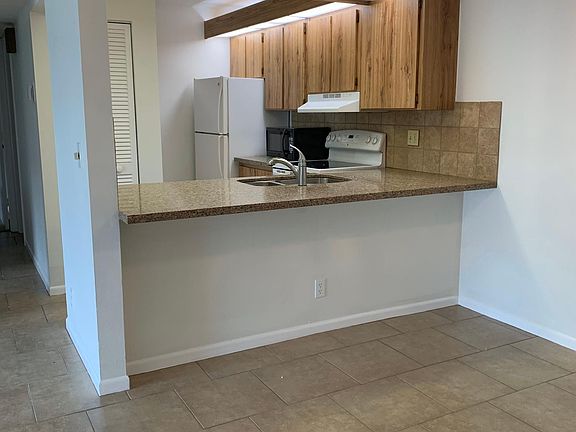 3rd image of 3402 Gardens East Dr APT 14B
