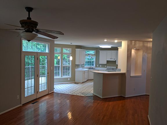 Kitchen opens into living room.