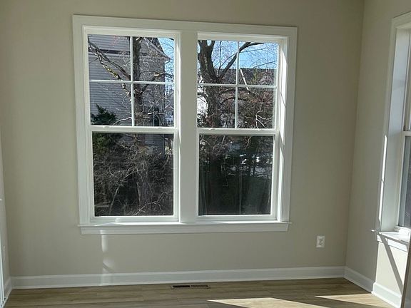 Morning room with double windows and access to outside at a DRB Homes Newbury II plan at the Barron