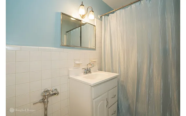 Sold by Douglas Elliman | media 11