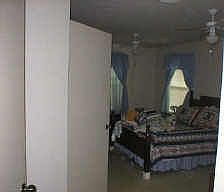 BEDROOM 1 WITH HANDICAP ACCESSIBLE BATH