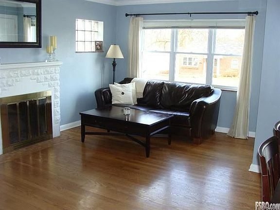 The Family Room features large windows with plenty of natural light