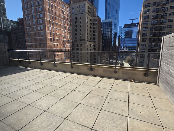 3rd image of 445 W 35th St #8E