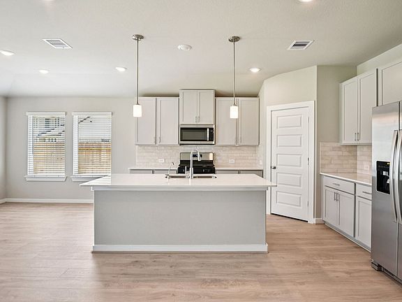 The Henderson floorplan in Kingdom Heights of Rosenberg, TX.