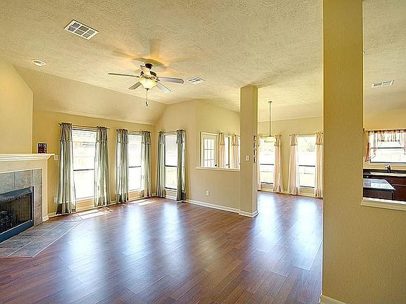 The open layout of the main living areas greet you as you enter the home.