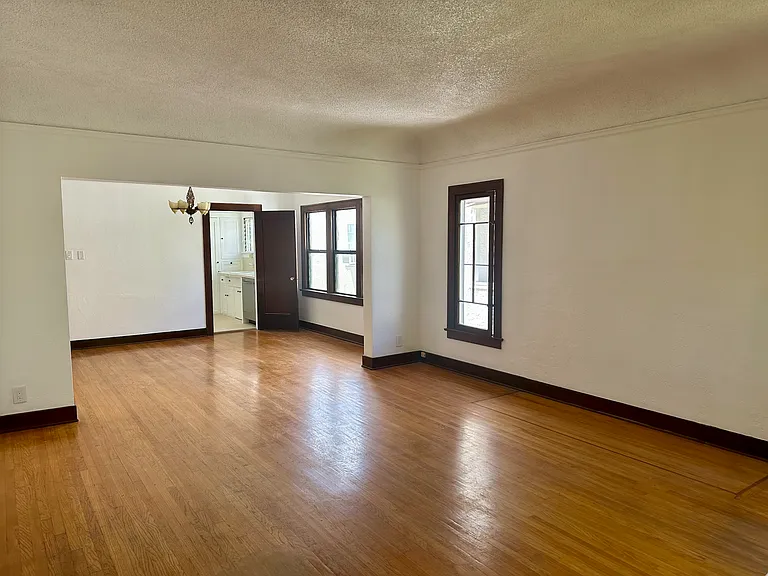 View of Living Room into dining room and Kitchen