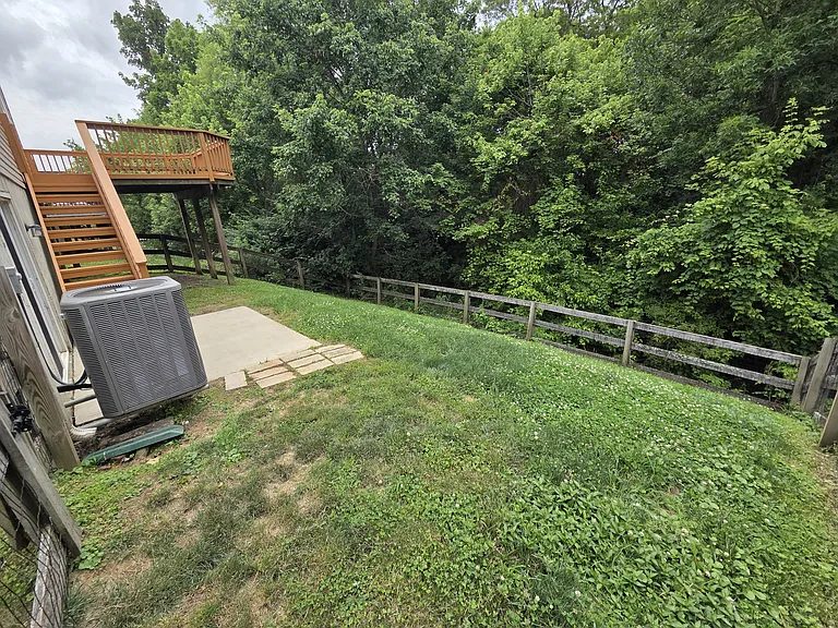 Private fenced back yard with patio.