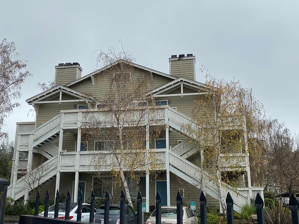 Exterior of the apartment building. The unit for rent is on the second floor on the left side of the building.