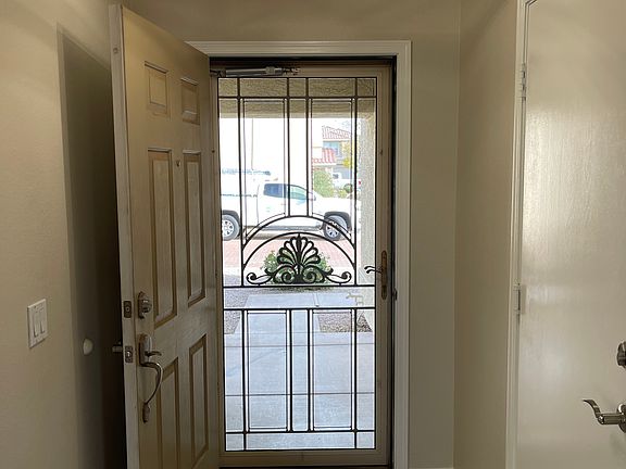 Front door entry looking out to front porch.