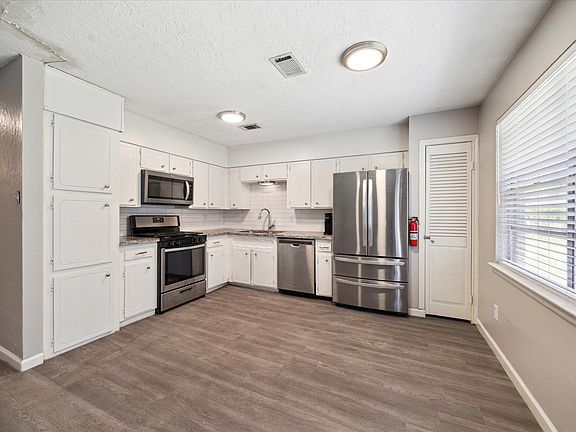 Kitchen adjacent to the living room.