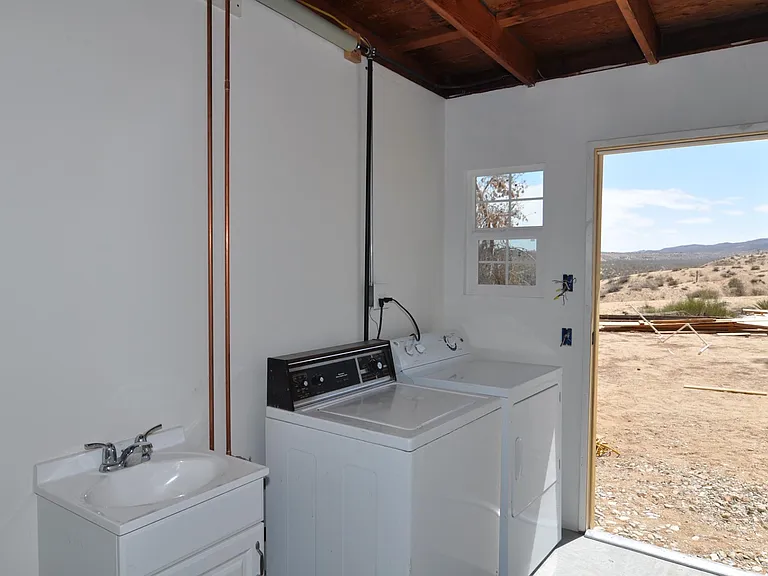 Laundry room is separate from the unit