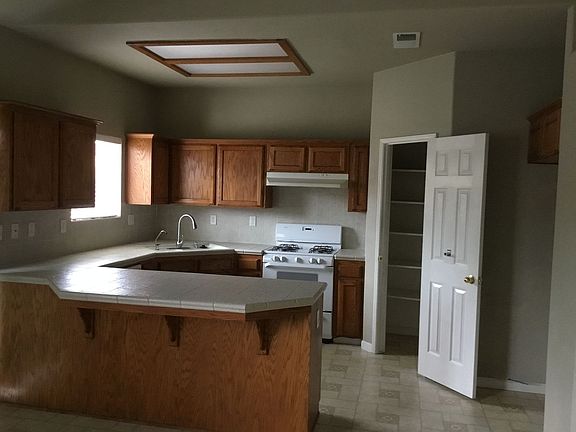 5th image of 6539 E Laurel Ave
