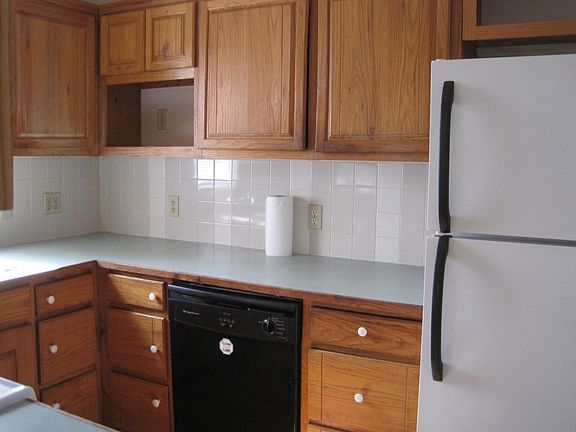 ice-maker. niche for microwave. tile backsplash.
