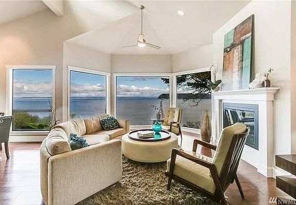 Living room with panoramic views of Whidbey, the Sound, and
