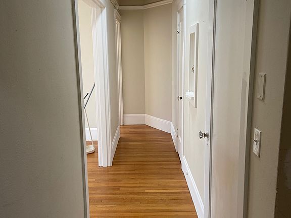 hallway with two closets