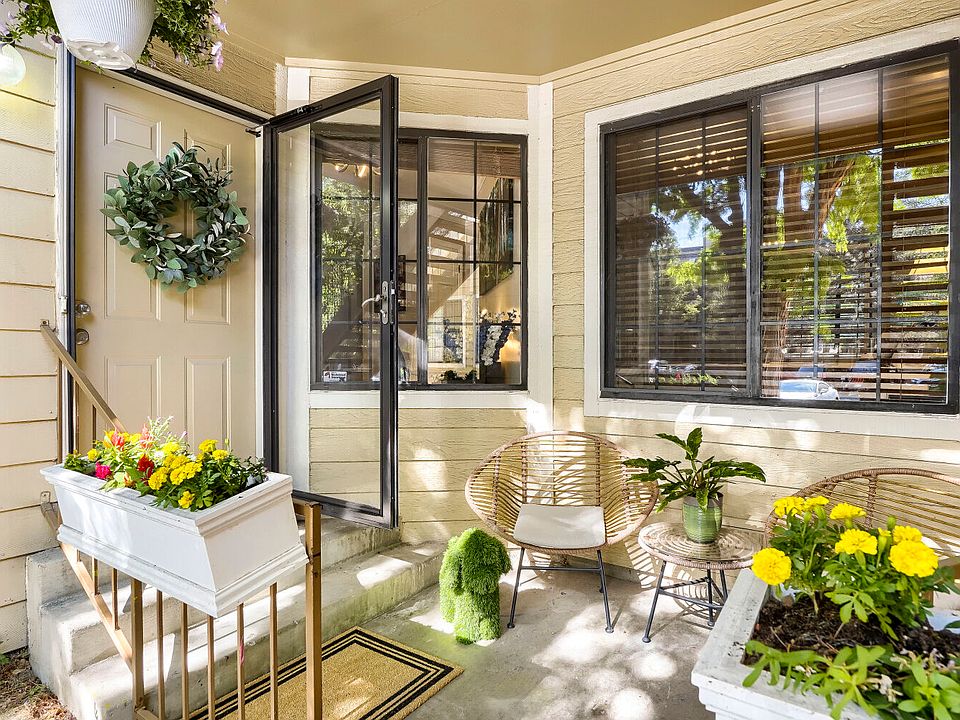 Private Patio & Ground-Level Entry _ Enjoy seamless indoor-outdoor living with a private patio and convenient ground-level entry, ideal for morning coffee, evening relaxation, or taking in the beautifully landscaped surroundings.
