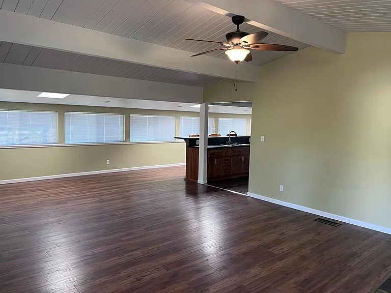 Standing in the entry at the front door