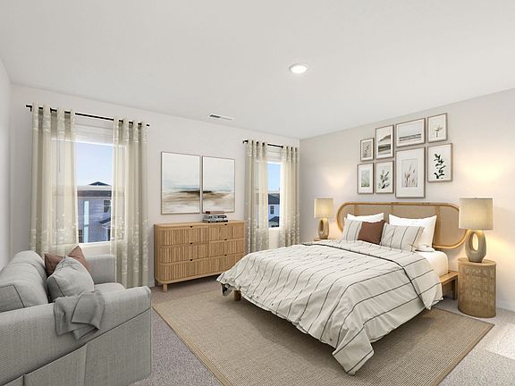 Primary bedroom in the Lennon floorplan at a Meritage Homes community in Garner, NC.