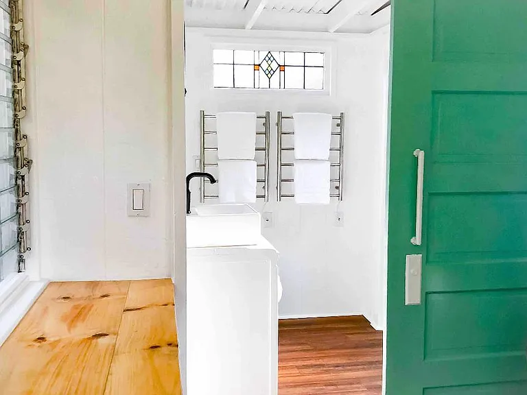 Entrance to indoor bathroom/outdoor shower